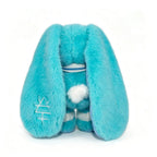 Plush blue Dysautonomia Rabbit toy with long droopy ears, white tail, and embroidered ear, facing away.