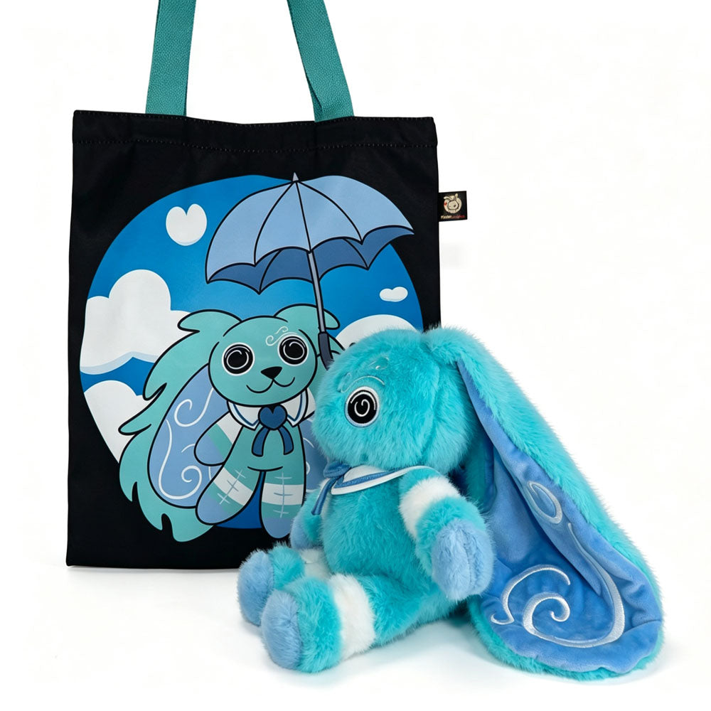 Blue plush Dysautonomia Rabbit sits beside a black tote bag featuring the bunny with an umbrella on a blue background.