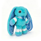 Blue plush Dysautonomia Rabbit with long ears, spiral eyes, striped legs, and sailor collar stands on white background.