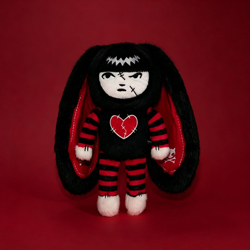 Autographed Emily the Strange and Plushie Dreadful Rabbit collaboration collector set with a black and red goth bunny plush toy, an I Love Cats canvas tote bag, ink pen, coin purse, and signed card by American McGee and Rob Reger.