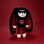 Autographed Emily the Strange and Plushie Dreadful Rabbit collaboration collector set with a black and red goth bunny plush toy, an I Love Cats canvas tote bag, ink pen, coin purse, and signed card by American McGee and Rob Reger.