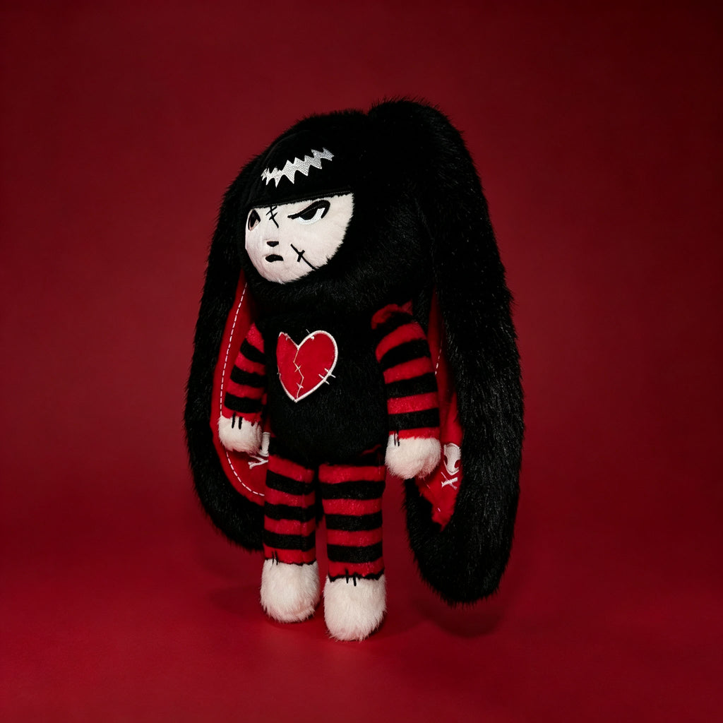 Autographed Emily the Strange and Plushie Dreadful Rabbit collaboration collector set with a black and red goth bunny plush toy, an I Love Cats canvas tote bag, ink pen, coin purse, and signed card by American McGee and Rob Reger.