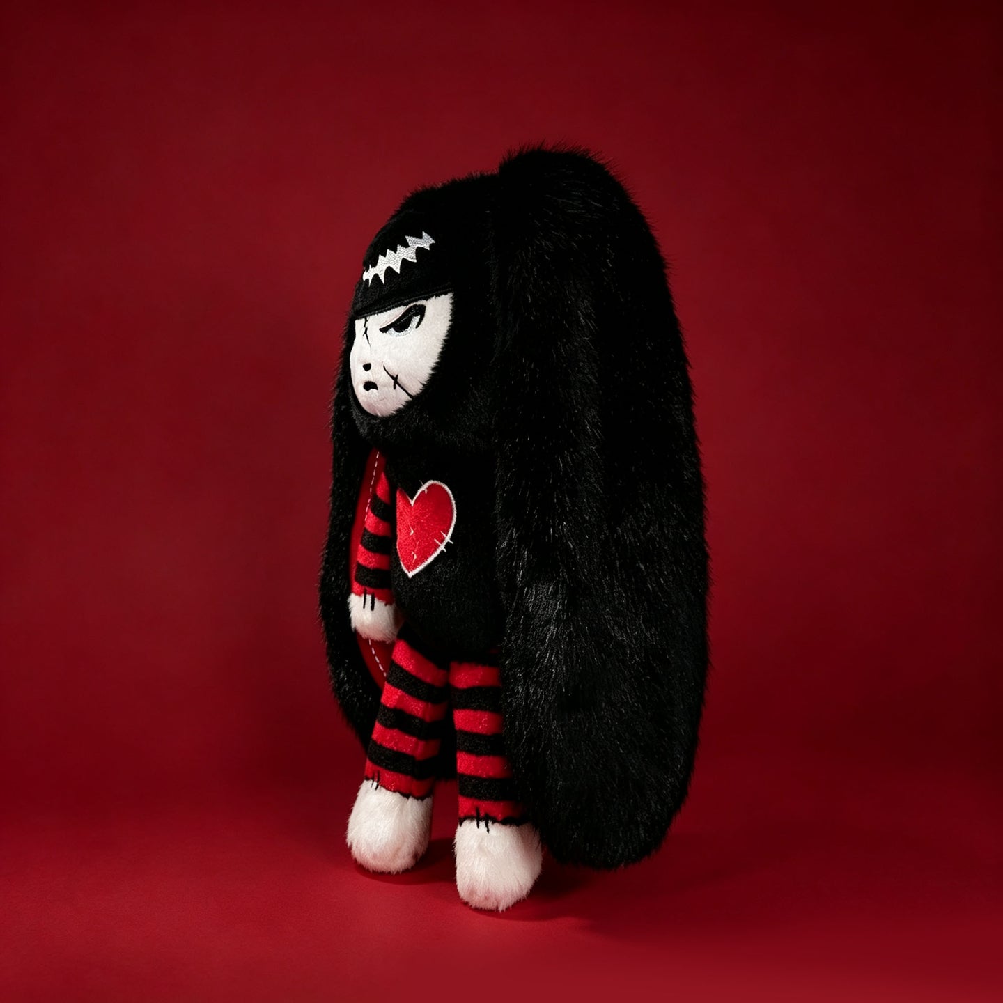 Autographed Emily the Strange and Plushie Dreadful Rabbit collaboration collector set with a black and red goth bunny plush toy, an I Love Cats canvas tote bag, ink pen, coin purse, and signed card by American McGee and Rob Reger.