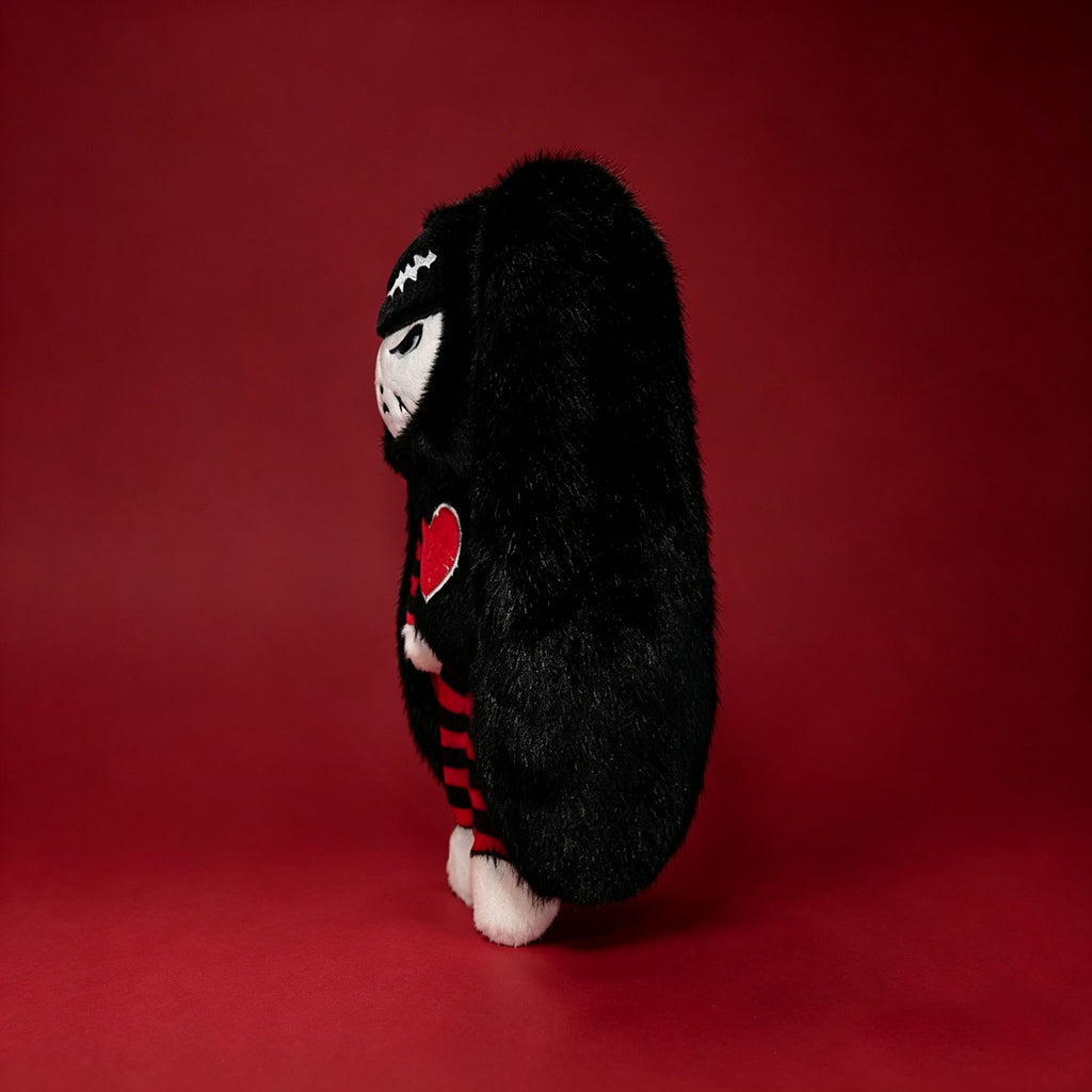 Autographed Emily the Strange and Plushie Dreadful Rabbit collaboration collector set with a black and red goth bunny plush toy, an I Love Cats canvas tote bag, ink pen, coin purse, and signed card by American McGee and Rob Reger.