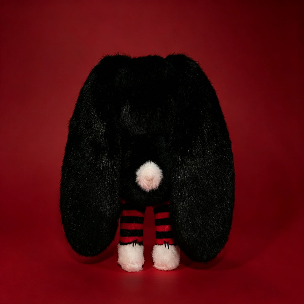 Autographed Emily the Strange and Plushie Dreadful Rabbit collaboration collector set with a black and red goth bunny plush toy, an I Love Cats canvas tote bag, ink pen, coin purse, and signed card by American McGee and Rob Reger.