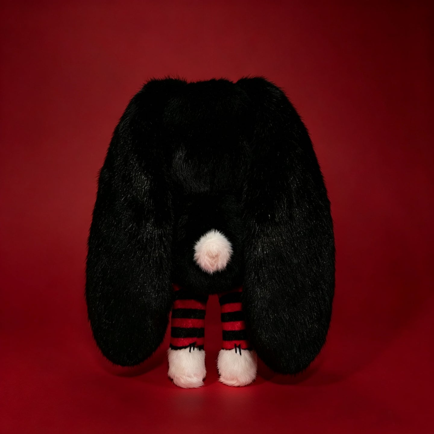 Autographed Emily the Strange and Plushie Dreadful Rabbit collaboration collector set with a black and red goth bunny plush toy, an I Love Cats canvas tote bag, ink pen, coin purse, and signed card by American McGee and Rob Reger.