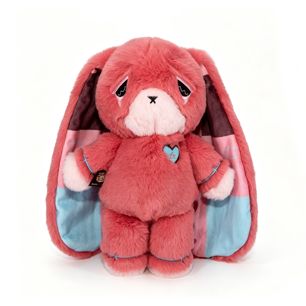 Pink plush bunny with long ears and a heart patch—an adorable awareness rabbit for any chronic illness gift or collection.