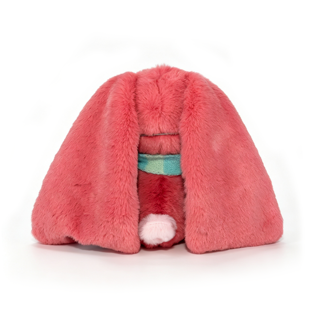 A plush toy with long pink fur, floppy ears, and a teal collar—an adorable Long COVID plushie on a white background.
