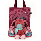 Plush pink awareness rabbit with long ears and scarf sits by a pink tote bag—thoughtful chronic illness gift.