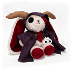 Plushie Dreadfuls horned cloak bunny, one button eye, purple cloak, holding a stitched doll on white background.