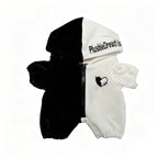 Black and white plushie jumpsuit outfit with Plushie Dreadfuls text and a stitched heart design on the chest.