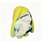 A yellow Plushie Dreadfuls bunny in a plushie jumpsuit hoodie, facing away on a white background.
