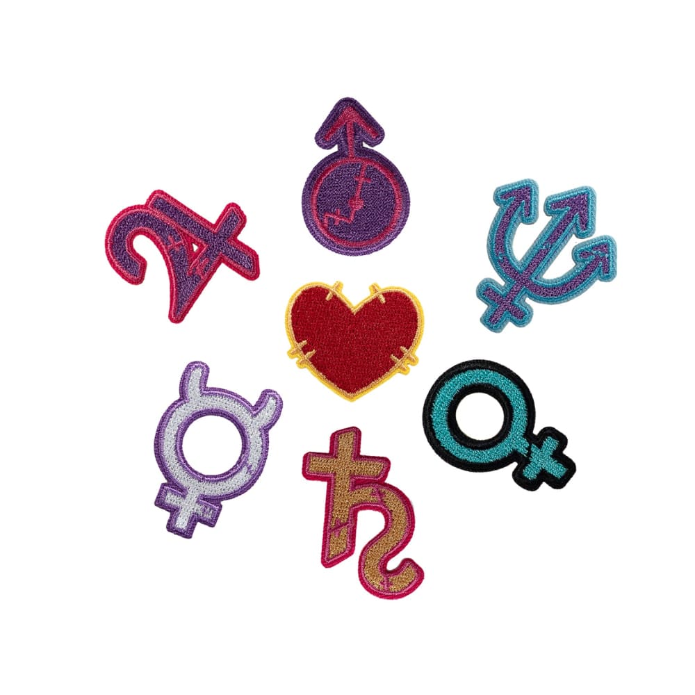 Seven colorful gender symbols and a heart patch arranged in a circle like planetary sign patches on a white background.