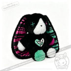 Plush black bunny with striped ears, green heart and tail—perfect as an emotional support bunny or mental health gift.