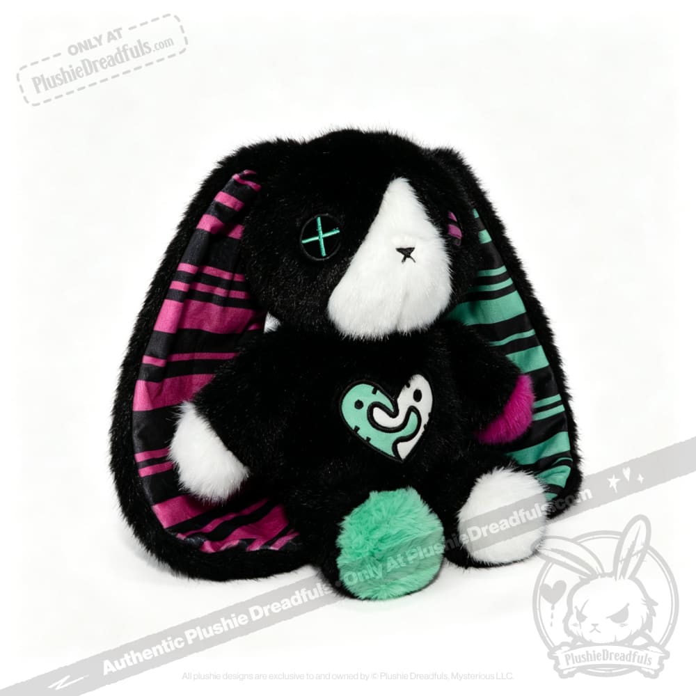 Plush black bunny with striped ears, green heart and tail—perfect as an emotional support bunny or mental health gift.