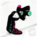 Plush toy with black fur, colorful paws—an emotional support bunny and unique mental health gift on a white background.