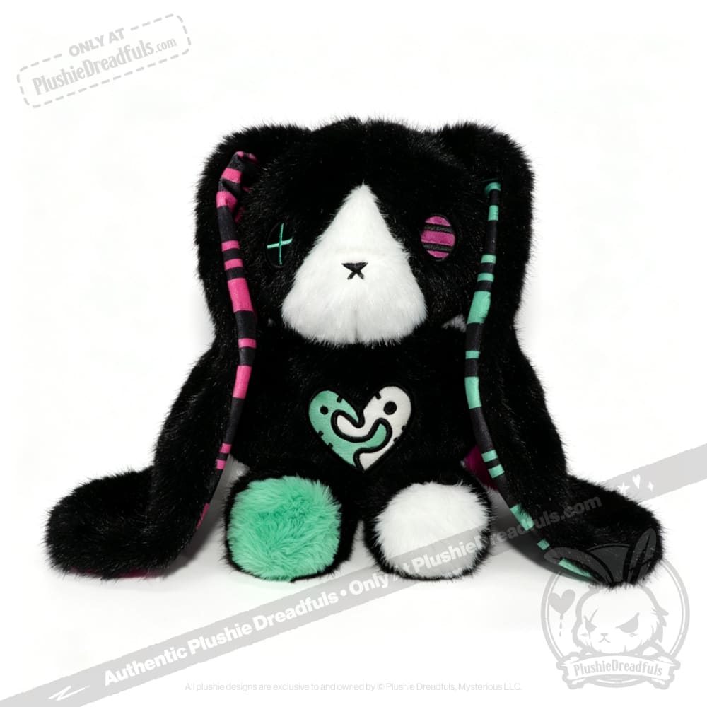 Plush black bunny with mismatched eyes, striped ears—a lovable bipolar I plushie and thoughtful mental health gift.