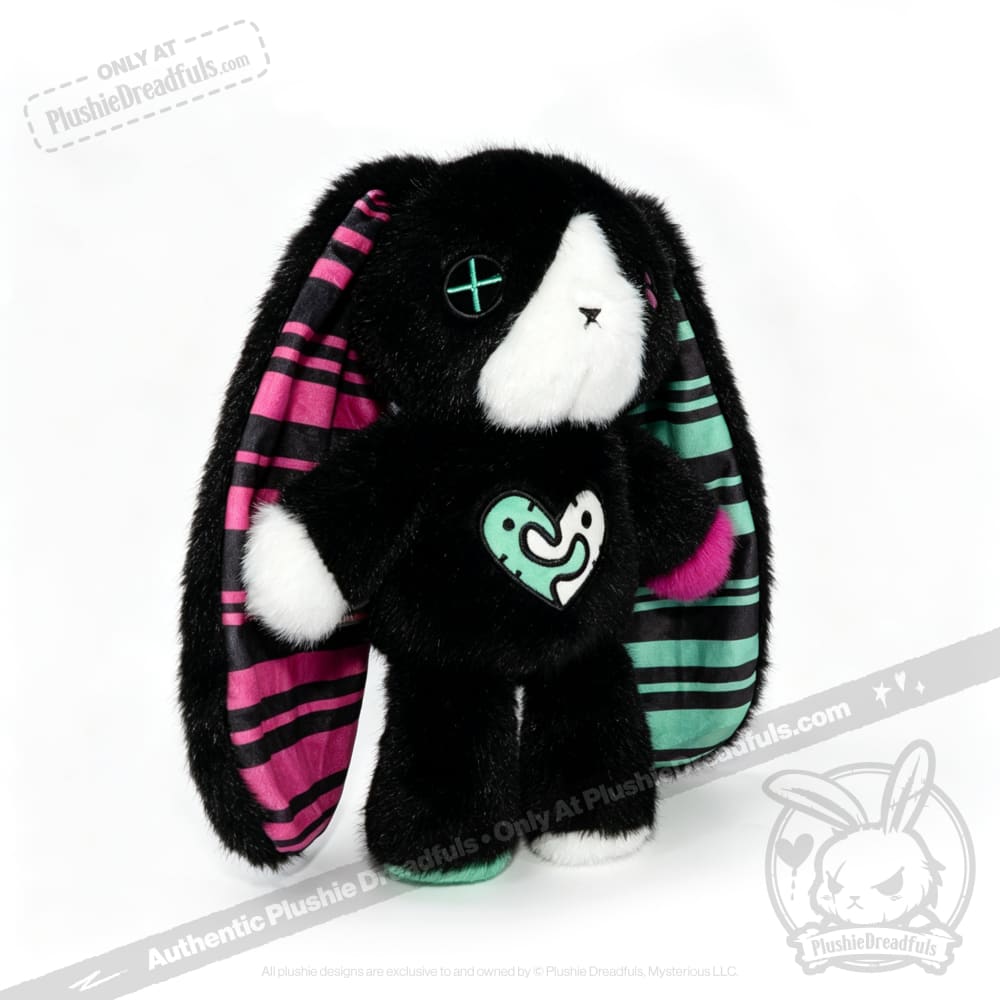 Plush black bunny with striped pink and green ears, a button eye—an emotional support bunny for mental health gifting.