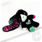 Plush black bunny with colorful striped ear, heart patch—perfect as an emotional support bunny or mental health gift.