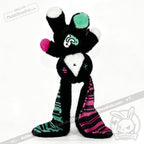 Plush toy bunny with long striped ears, black fur, and white face—an adorable emotional support bunny gift.