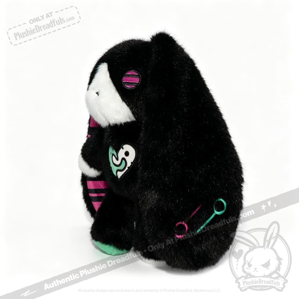 Plush black bunny with pink and green, large floppy ears—a perfect emotional support bunny or mental health gift.