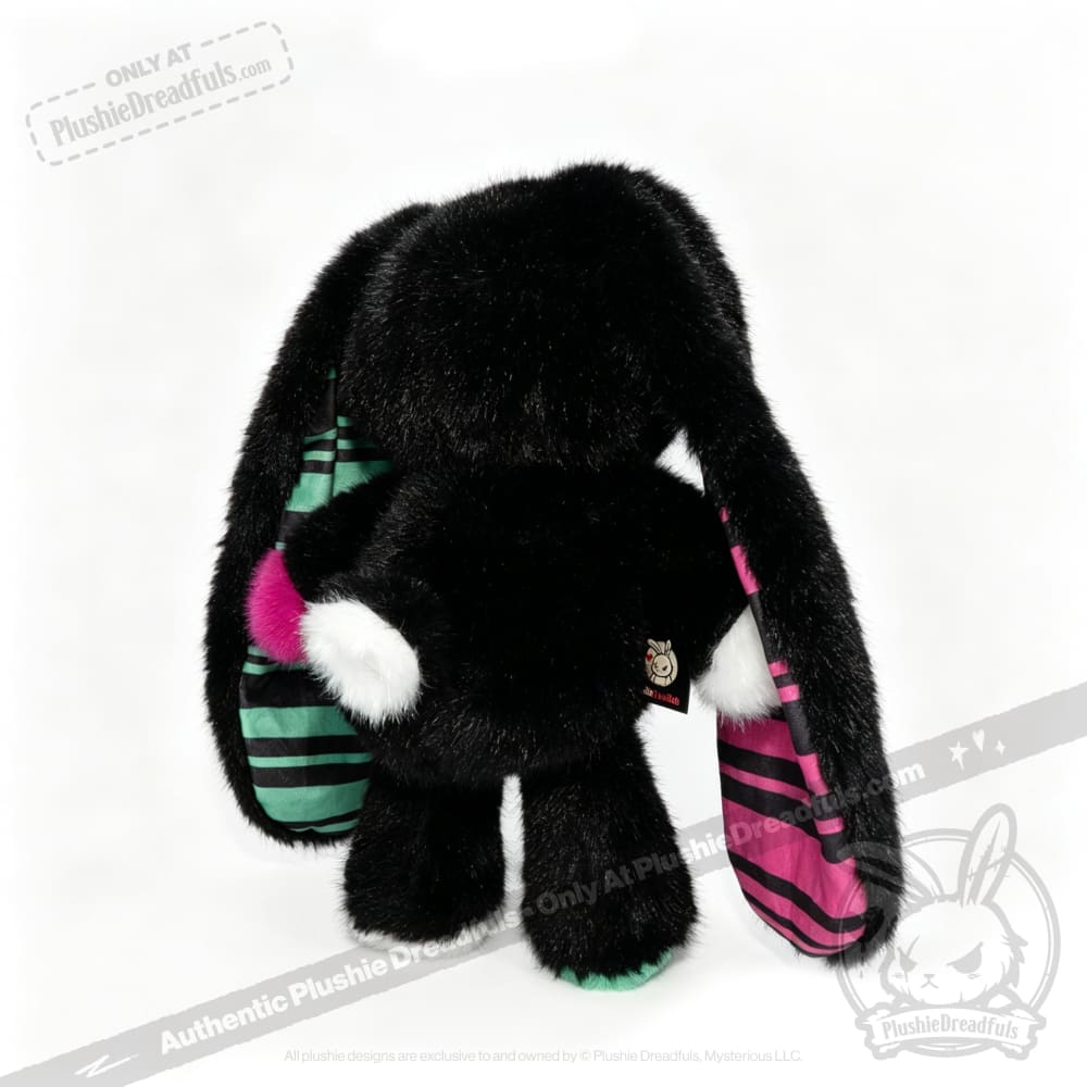 A black plush bunny with striped ears, perfect as an emotional support bunny or thoughtful mental health gift.