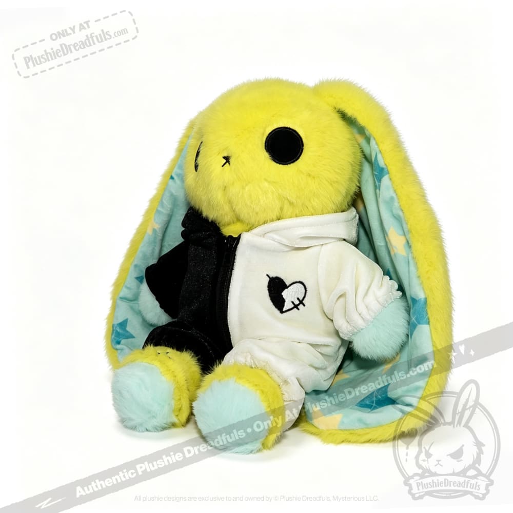Yellow plush bunny from Plushie Dreadfuls wears a split black and white hoodie—perfect for regular sized plushies.