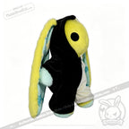 Plushie Dreadfuls regular sized plushies: yellow bunny in a black plushie jumpsuit, mint paws, floppy ears, side view.