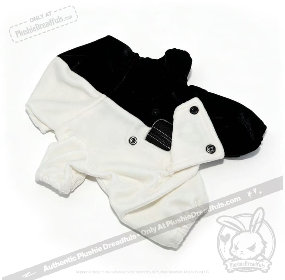 Black and white fleece dog onesie with buttons and elastic cuffs, styled like a Plushie Dreadfuls plushie jumpsuit.