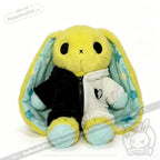 Plushie Dreadfuls yellow bunny with long ears, blue star ear lining, half-black, half-white hoodie; regular sized plushie.