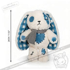 Blueplaid plush bunny with button eye, long ears, gray scarf—perfect for sending love letters across the Seas of Love.