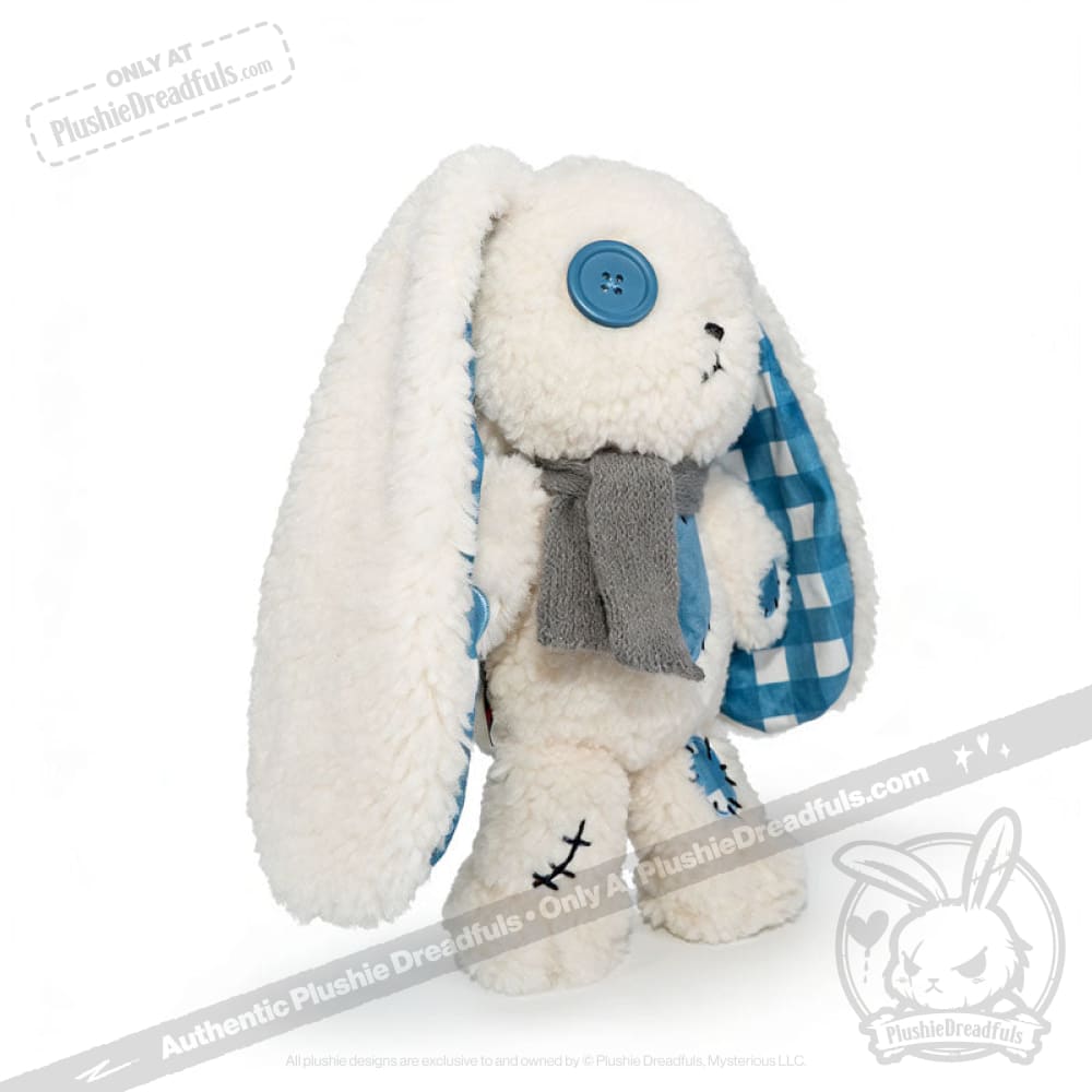 Blueplaid plush bunny with long ears, blue button eye, scarf; a sweet Seas of Love friend viewed from the side.