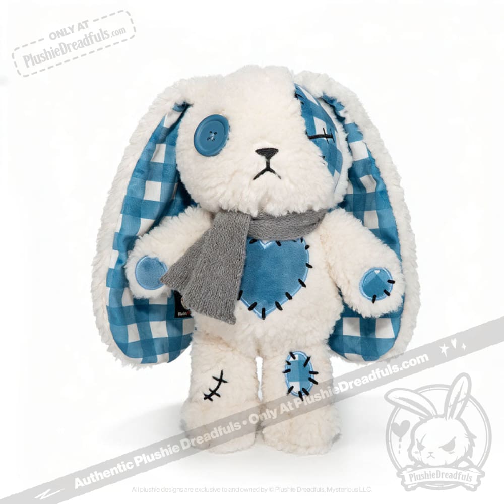 Blueplaid plush bunny with blue patches, button eyes, and a gray scarf—perfect for sharing seas of love.