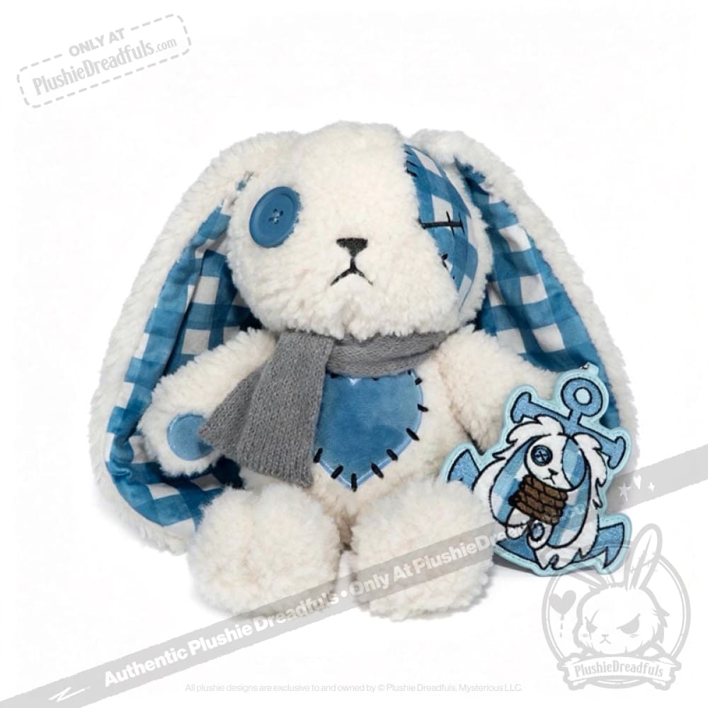 Blueplaid plush bunny with checkered ears, gray scarf, and keychain—perfect for sending Seas of Love.