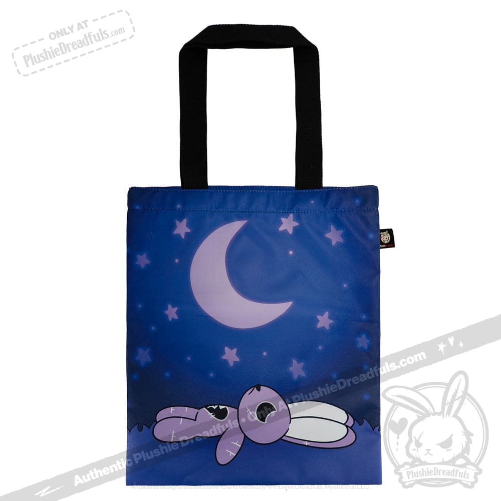 A LIMITED EDITION tote bag featuring a cartoon bunny under a crescent moon and stars on a blue background.