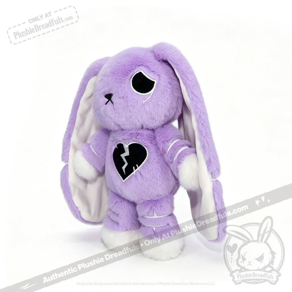 LIMITED EDITION plush purple bunny with floppy ears, a sad black eye, and a broken heart for depression awareness.