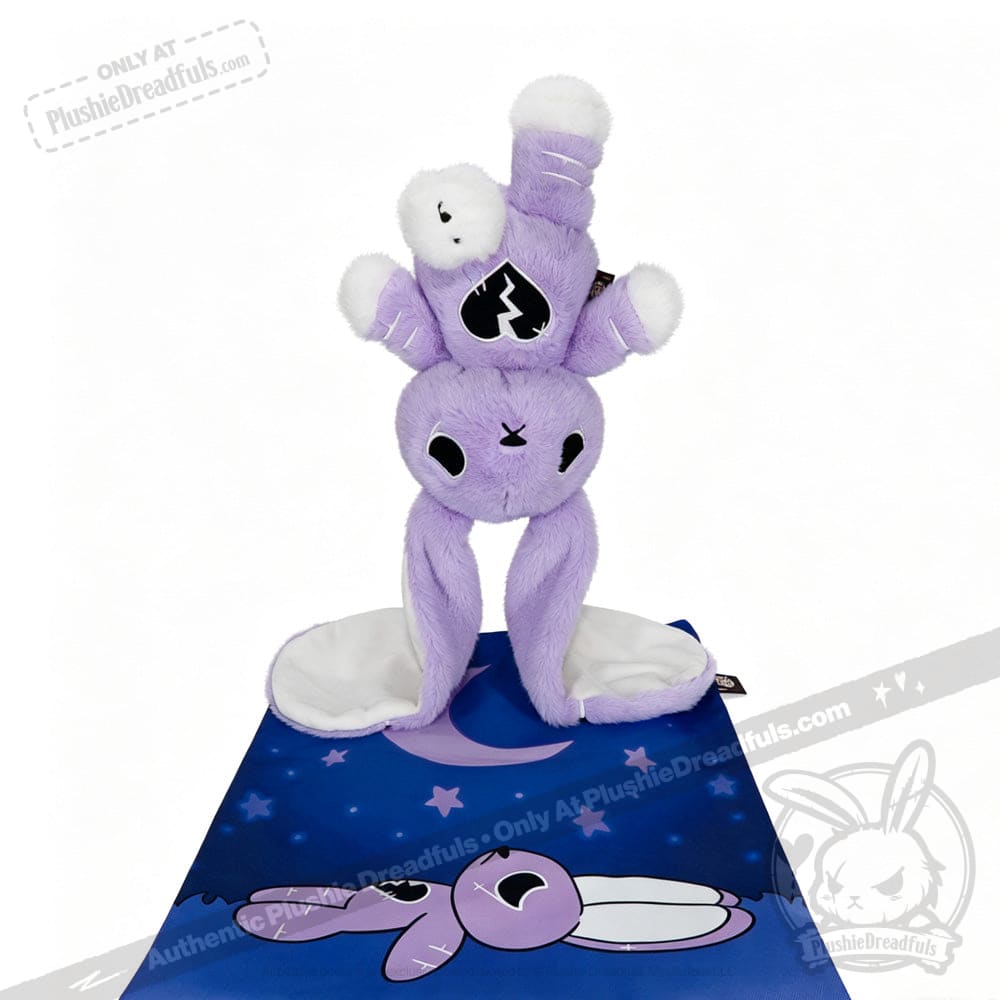 LIMITED EDITION: Purple plush bunny balancing on its hands, featuring depression awareness, on a blue starry mat.