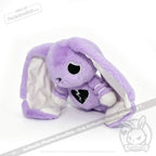 Purple plush bunny with floppy ears, a semicolon symbol and broken heart patch—LIMITED EDITION for depression awareness.