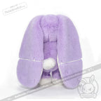 Plush lavender bunny with long floppy ears; LIMITED EDITION for depression awareness, facing away.