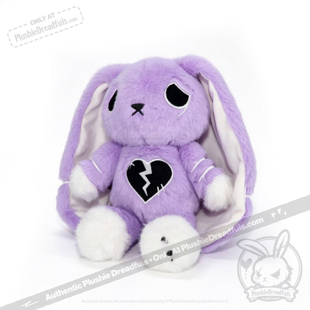 A purple plush bunny with floppy ears, a semicolon symbol on its chest, and sad eyes sits upright for depression awareness.