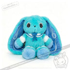 A blue Dysautonomia Rabbit with long floppy ears, black button eyes, and a sailor collar sits facing forward.