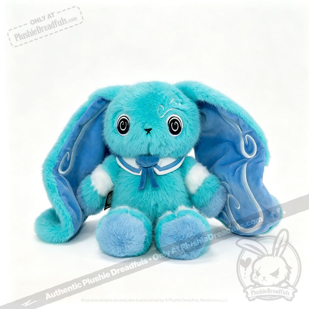 A fluffy blue Dysautonomia Rabbit with large droopy ears, white accents, and a blue ribbon around its neck.