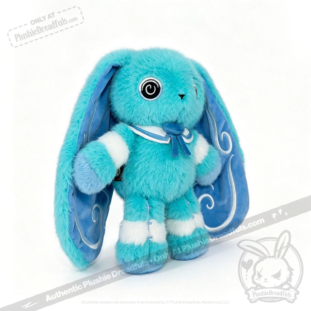 Blue plush Dysautonomia Rabbit with long ears, spiral eyes, striped legs, and sailor collar stands on white background.