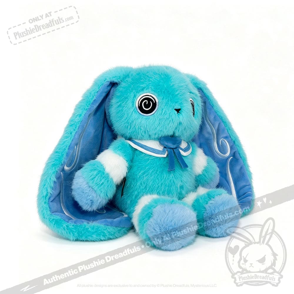 Plush blue Dysautonomia Rabbit with long floppy ears, white accents, and a blue ribbon sits on a white background.