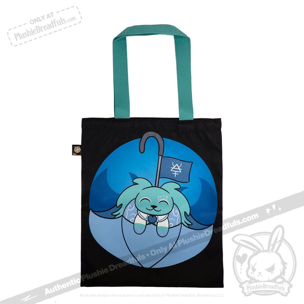 A black tote with teal handles features Dysautonomia Rabbit holding a flag while sitting in an umbrella.
