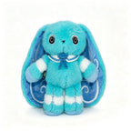 Blue plush Dysautonomia Rabbit with white stripes, floppy ears, sailor collar, and a blue ribbon bow stands facing forward.