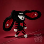 Autographed Emily the Strange and Plushie Dreadful Rabbit collaboration collector set with a black and red goth bunny plush toy, an I Love Cats canvas tote bag, ink pen, coin purse, and signed card by American McGee and Rob Reger.