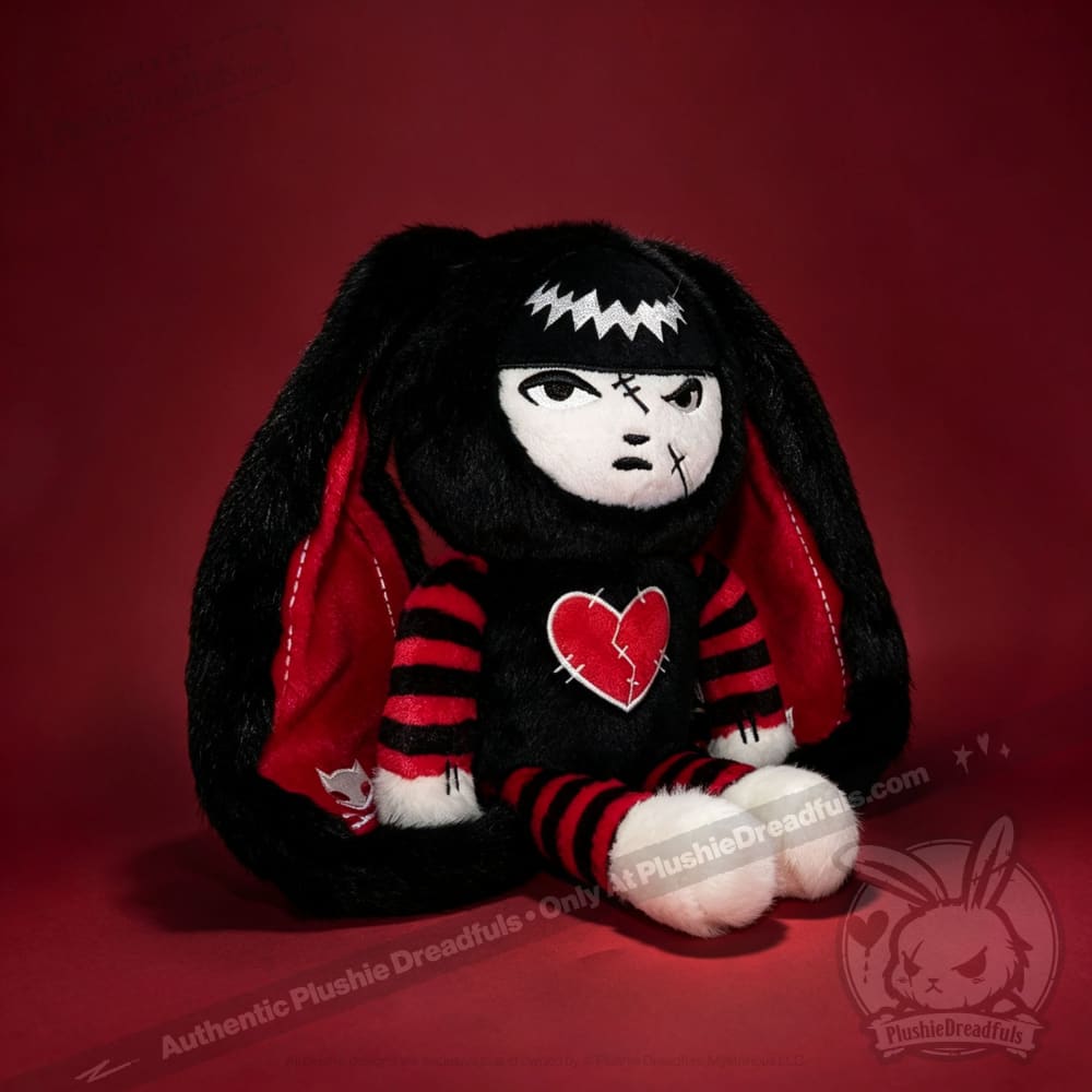 Autographed Emily the Strange and Plushie Dreadful Rabbit collaboration collector set with a black and red goth bunny plush toy, an I Love Cats canvas tote bag, ink pen, coin purse, and signed card by American McGee and Rob Reger.