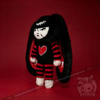Autographed Emily the Strange and Plushie Dreadful Rabbit collaboration collector set with a black and red goth bunny plush toy, an I Love Cats canvas tote bag, ink pen, coin purse, and signed card by American McGee and Rob Reger.