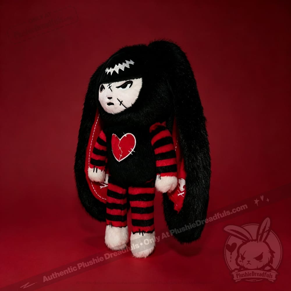 Autographed Emily the Strange and Plushie Dreadful Rabbit collaboration collector set with a black and red goth bunny plush toy, an I Love Cats canvas tote bag, ink pen, coin purse, and signed card by American McGee and Rob Reger.